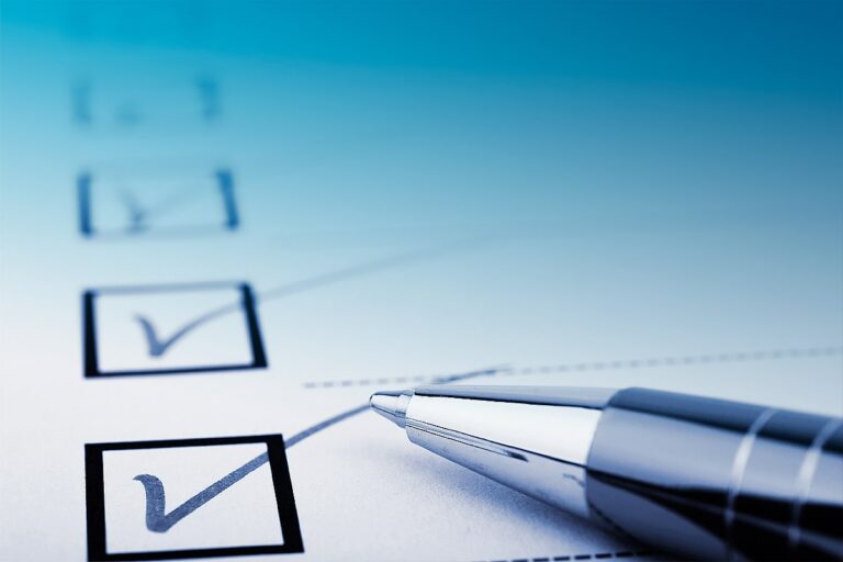 A ballpoint pen and a checklist